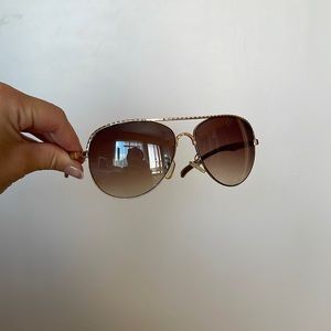 Rose gold aviator style sunglasses